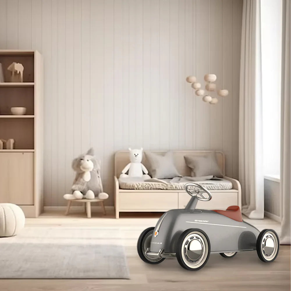 children's room with a Baghera Speedster 365 toy car, bed, and shelves.