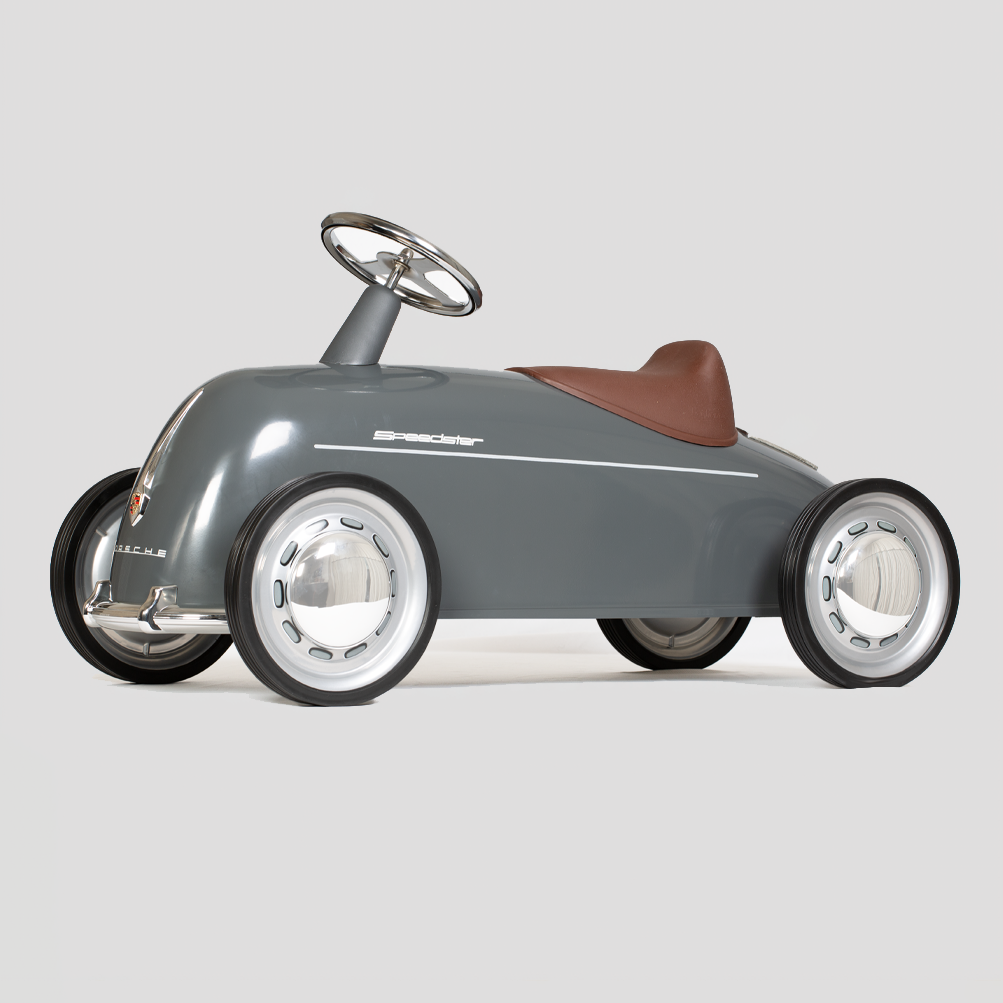 Baghera vintage-style Porsche Speedster 365 toy car with a grey body, brown seat, and silver wheels on a light grey background.