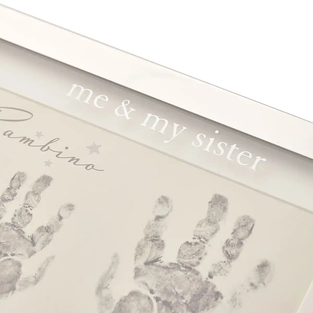 Bambino "Me & My Sister" baby handprint kit lettering details.