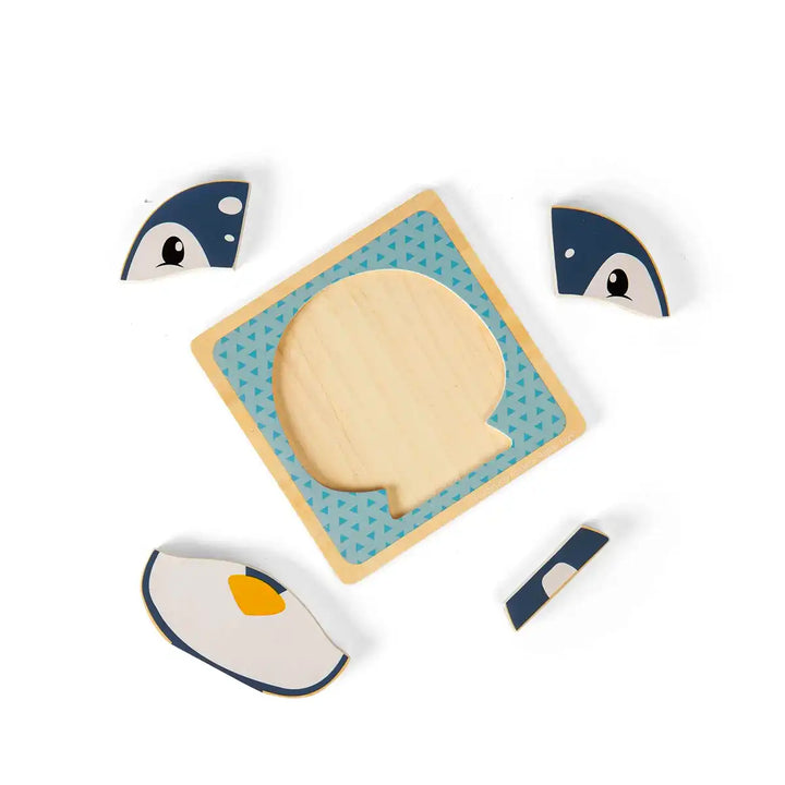 Bigjigs Toys children's wooden puzzle of a penguin face on a blue background
