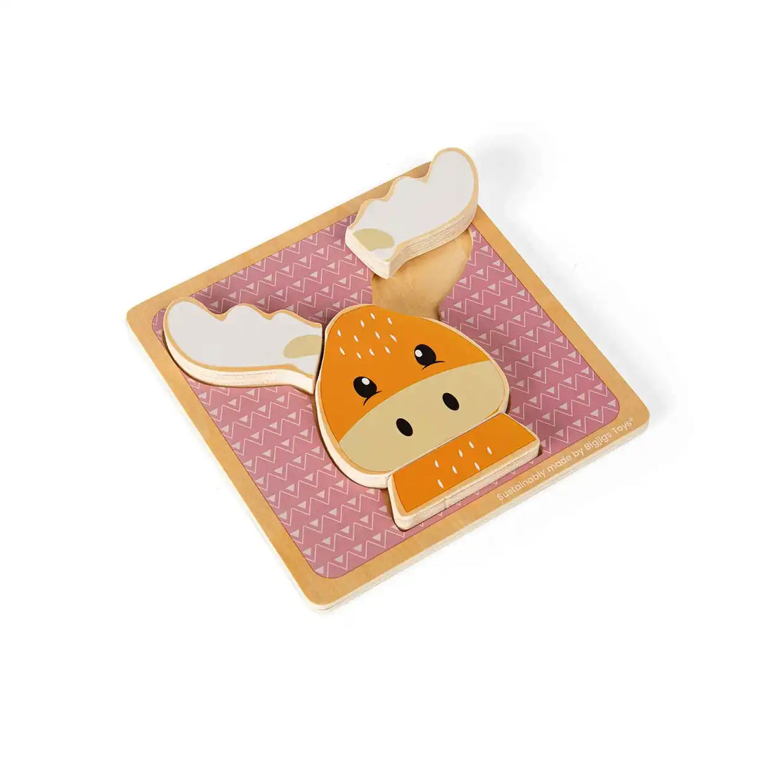 Bigjigs Toys children's wooden puzzle of a reindeer face on a pink background