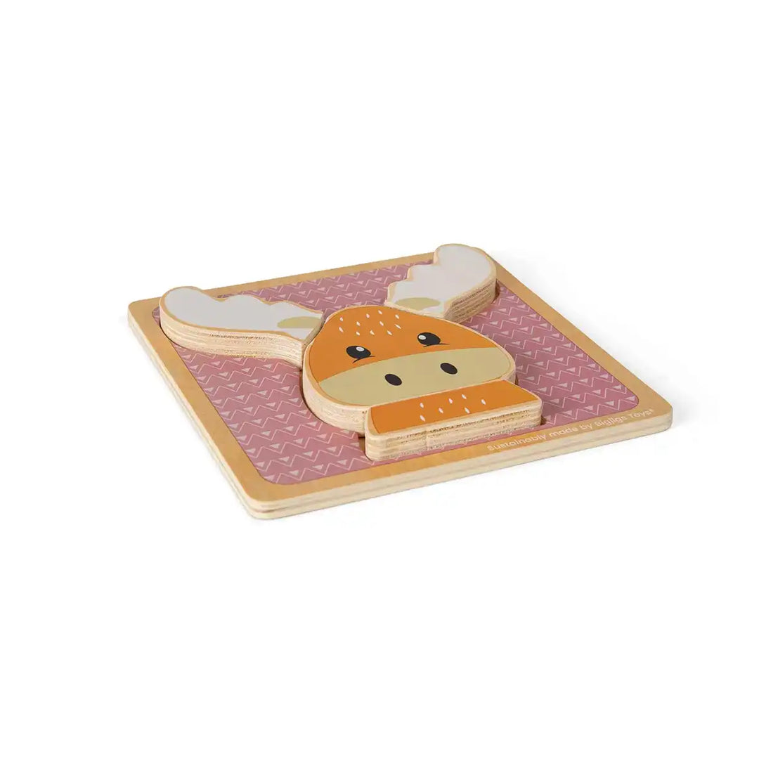 Bigjigs Toys children's wooden puzzle of a reindeer face on a pink background
