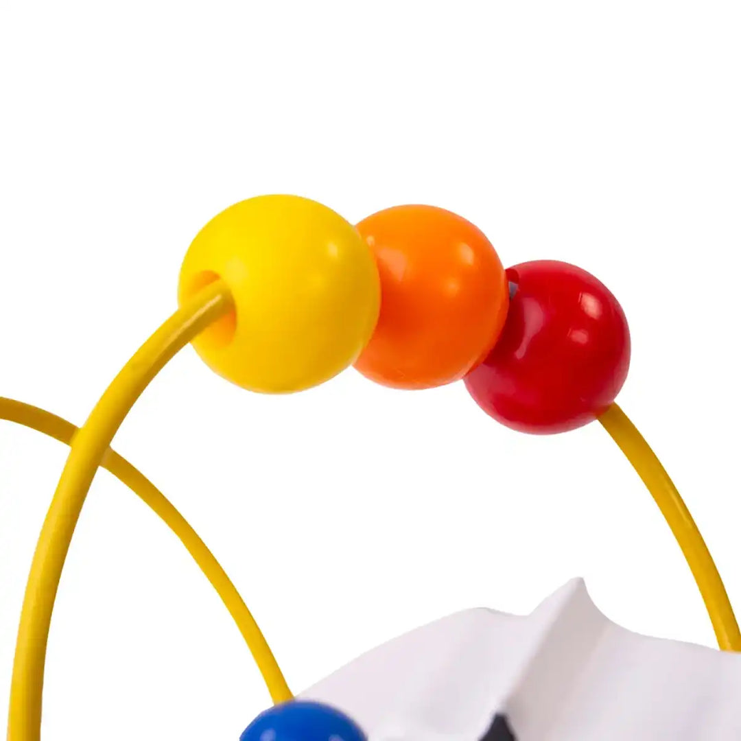 Bigjigs Toys wooden rocking cow bead frame with colourful beads on a white background