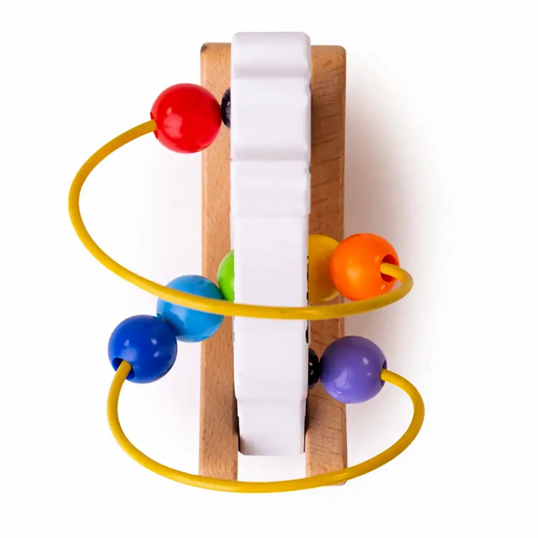 Bigjigs Toys wooden rocking cow bead frame with colourful beads on a white background