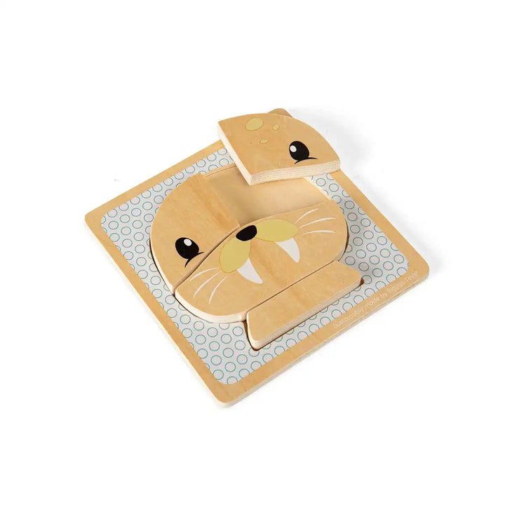 Bigjigs Toys children's wooden puzzle of a seal face on a grey background