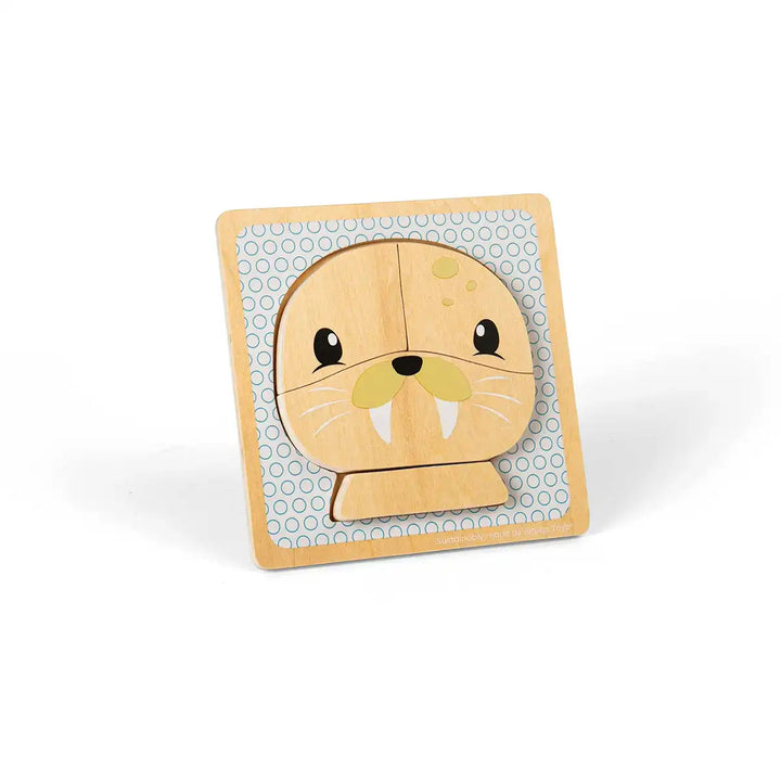 Bigjigs Toys children's wooden puzzle of a seal face on a grey background