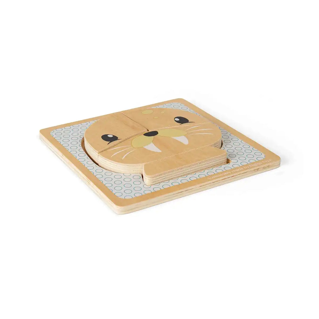 Bigjigs Toys children's wooden puzzle of a seal face on a grey background