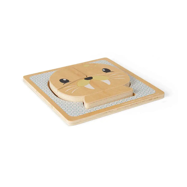 Bigjigs Toys children's wooden puzzle of a seal face on a grey background