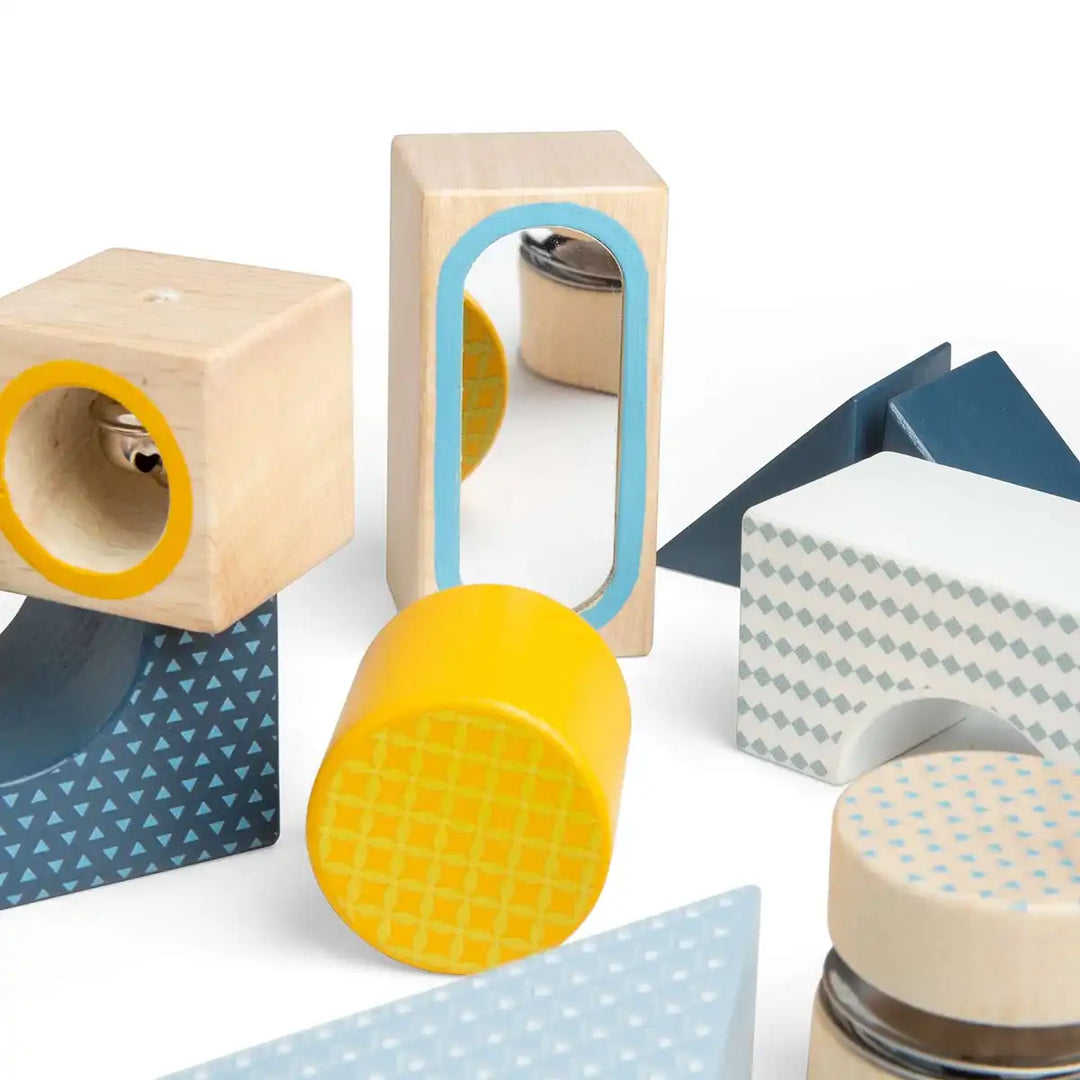 Bigjigs toys colourful geometric wooden sensory explorer blocks on a white background