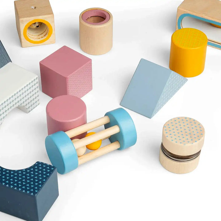 Bigjigs toys colourful geometric wooden sensory explorer blocks on a white background