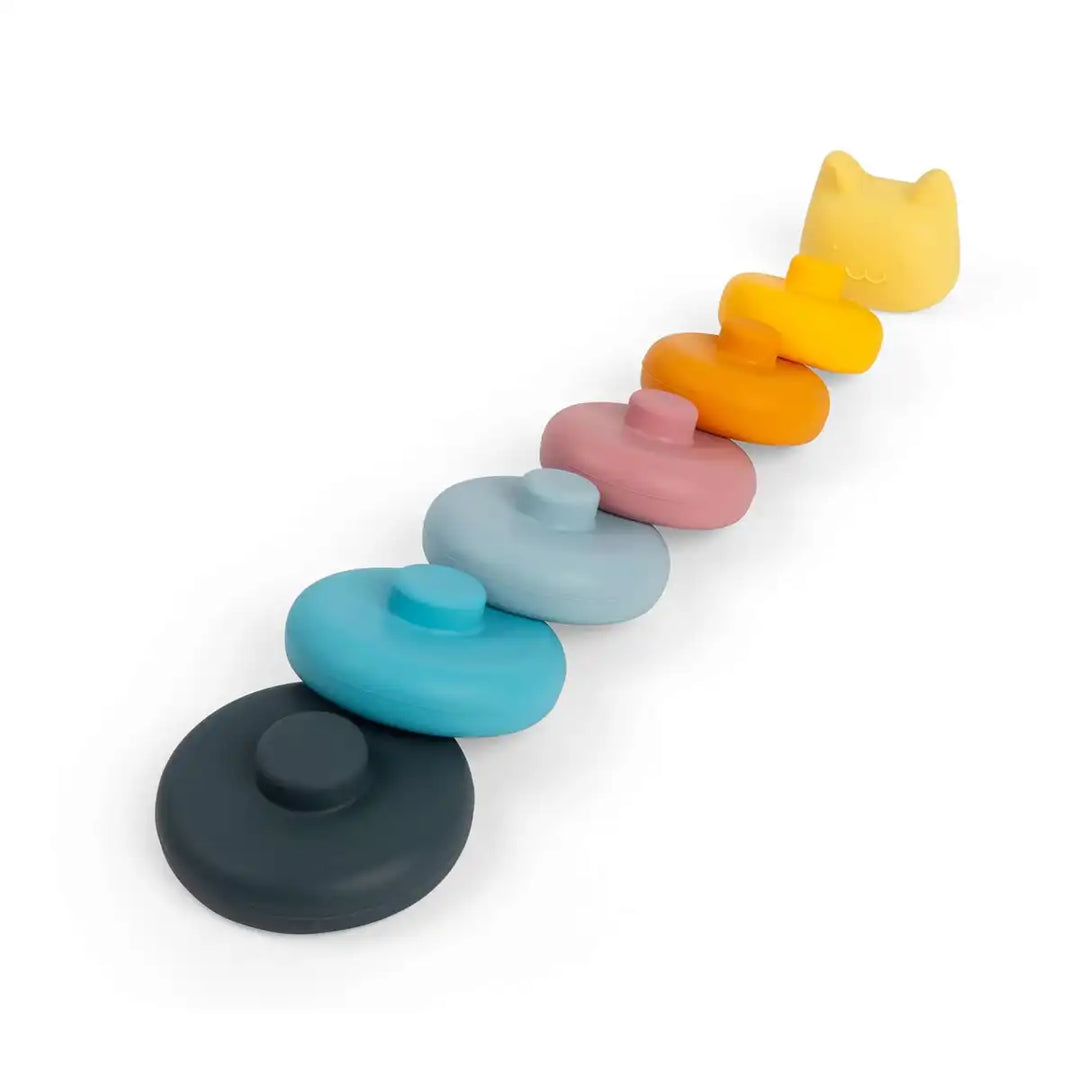 Set of colourful Bigjigs toys silicone stacking shapes with a cat-shaped lid on a white background