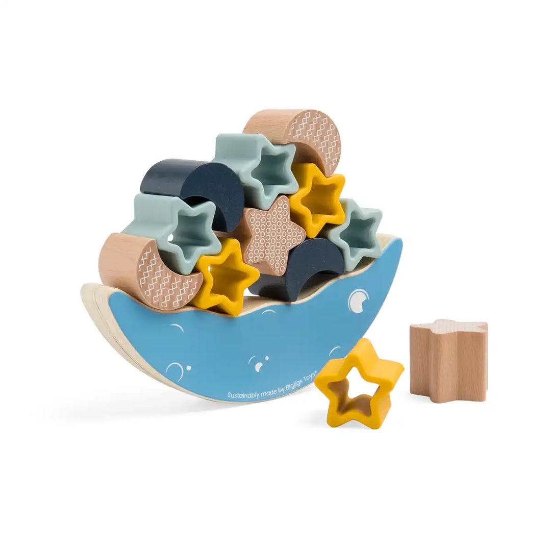 Bigjigs Toys wooden and silicone shape sorting toy with stars and moons on a white background