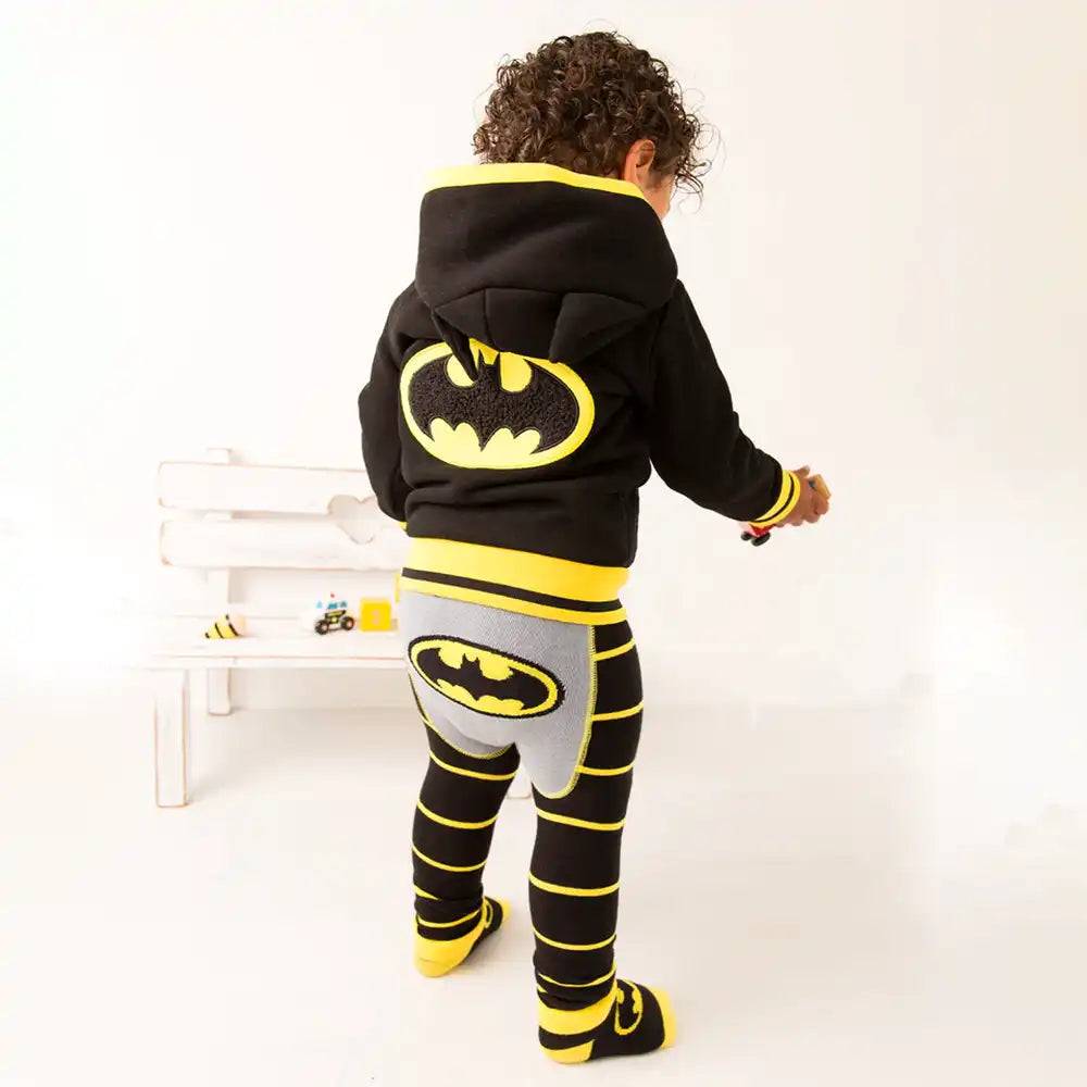 Child wearing a Blade and Rose Batman-themed outfit with a hoodie, leggings, and shoes on a white background.