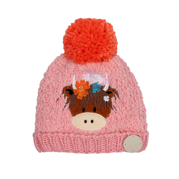 Pink Blade & Rose Bonnie Highland Cow knit beanie with orange pom-pom and cow design on a white background