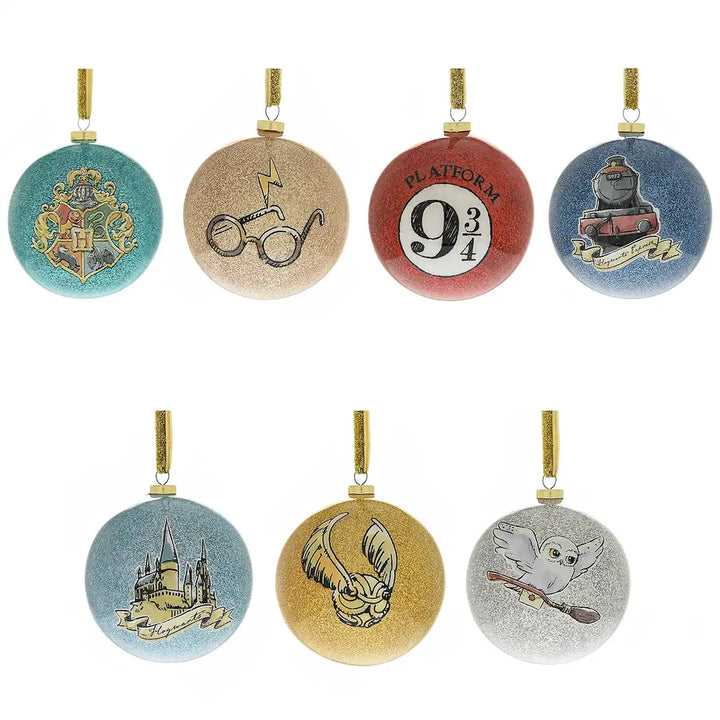 Set of 7 Harry Potter-themed Christmas bauble ornaments with various designs.