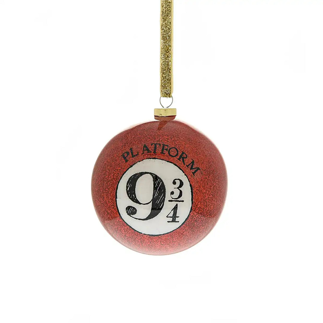 Harry Potter themed decorative bauble ornament with 'Platform 9 3/4' text on a red background