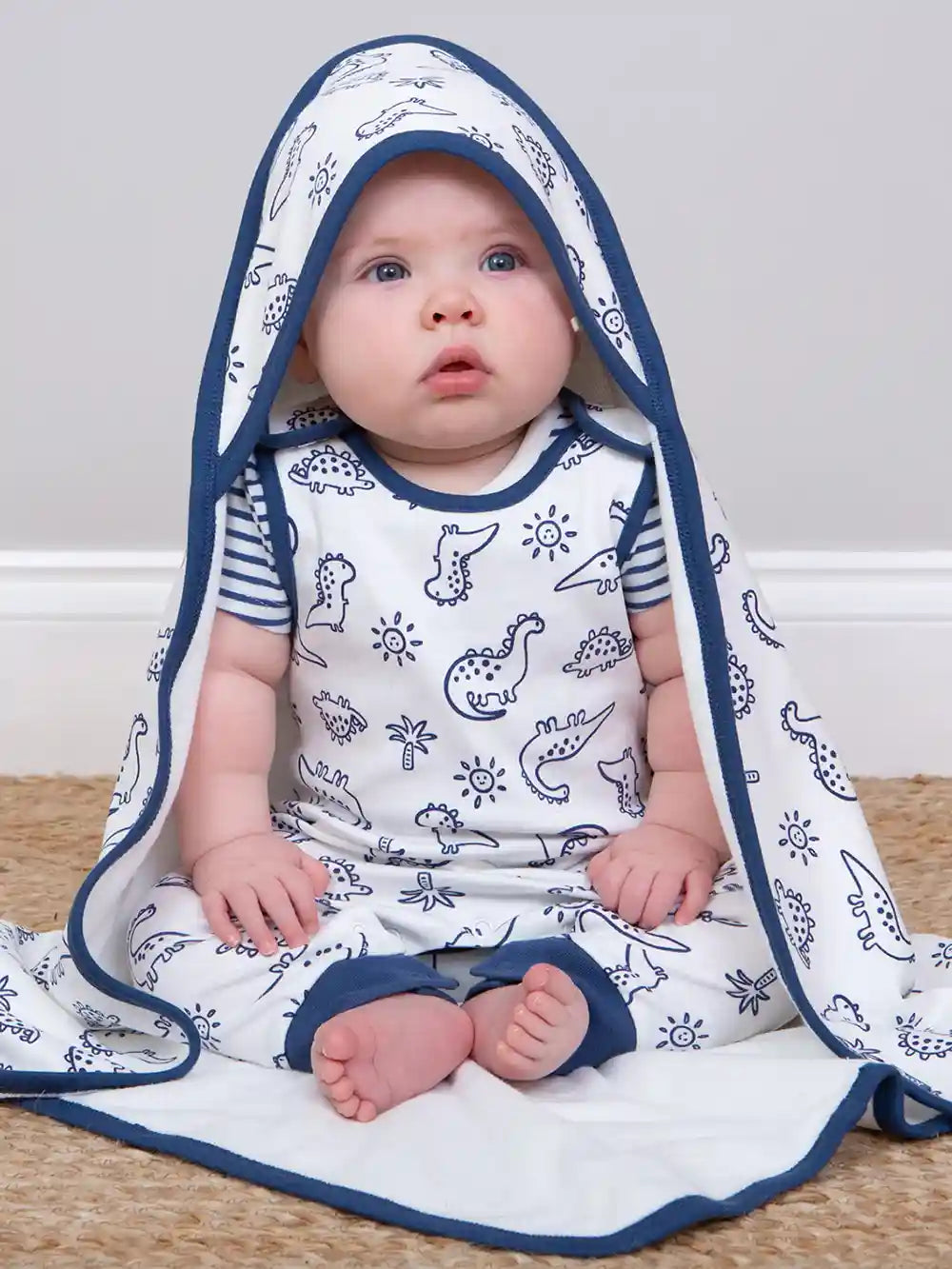 Kite Clothing GOTS Organic Cotton Dino Earth Cuddle Wrap Sitting Picture