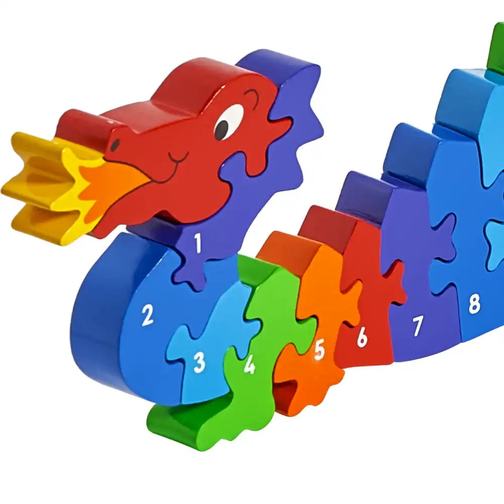 A colourful wooden Lanka Kade Dazzle the dragon puzzle toy made of numbered interlocking pieces, shown on a plain white background.