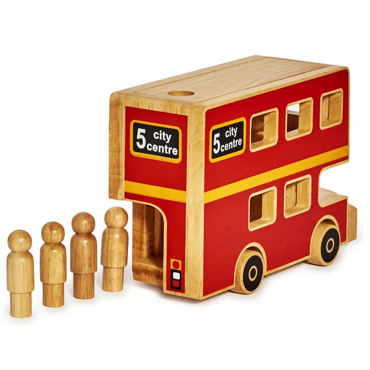 A Lanka Kade wooden double-decker bus toy with a red body, natural wood frame, and yellow stripe, shown with four small wooden person figures on a white background.
