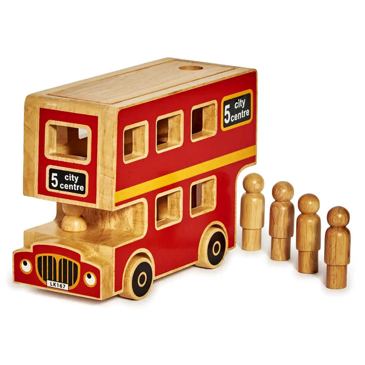 A Lanka Kade wooden toy double-decker bus in red and natural wood tones, shown with five small wooden person figures on a plain white background.