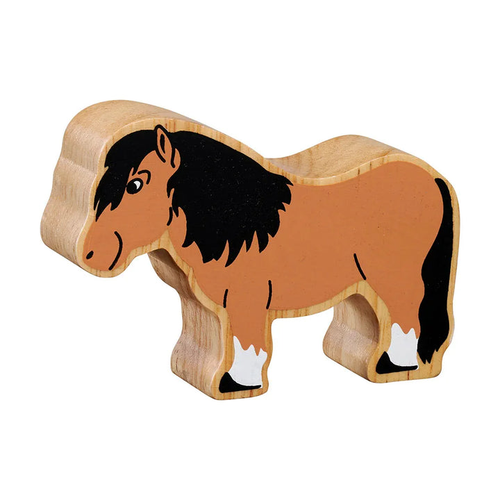 Lanka Kade wooden Shetland pony toy with brown body, black mane, and white feet on a white background