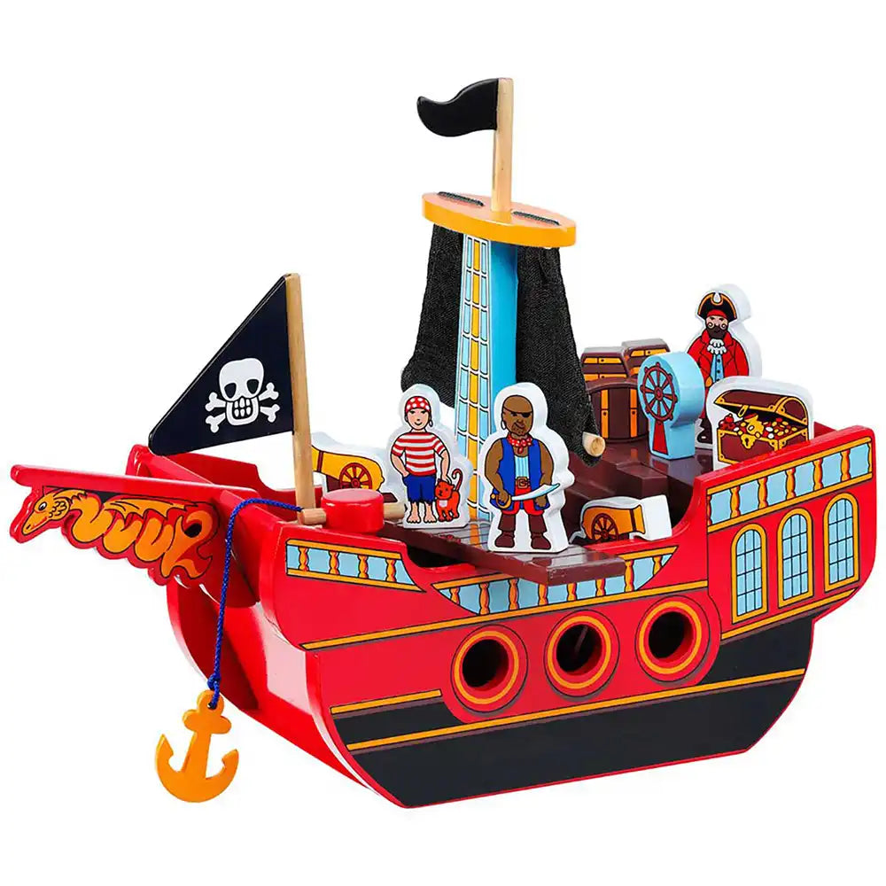 A colourful wooden Lanka Kade pirate ship toy with pirate figures, a black skull-and-crossbones flag, treasure chests, and an orange anchor, shown on a plain white background.