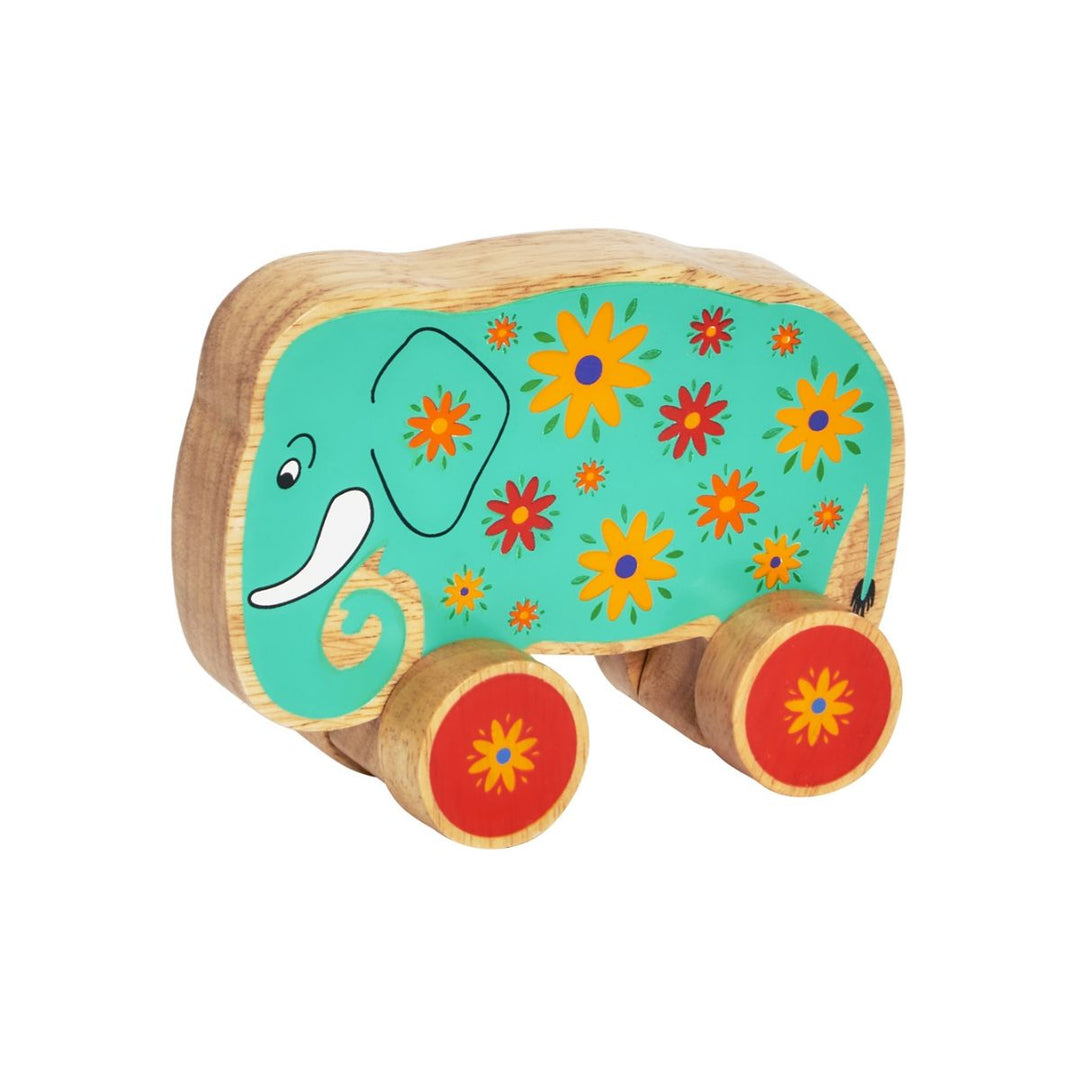 Lanka Kade colourful wooden toy green elephant pull along with floral patterns on a white background