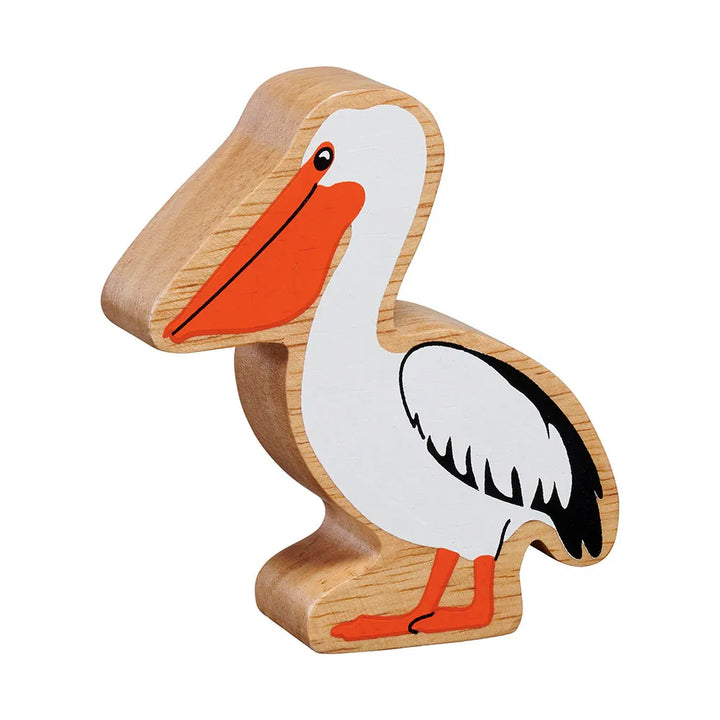 Lanka Kade wooden pelican, featuring a natural light wood body, a white head and body, orange beak and legs, and black wing details, shown on a plain white background.