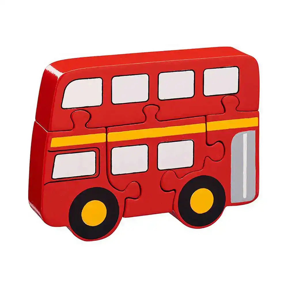 A red Lanka Kade double-decker bus-shaped jigsaw puzzle toy with white windows, a yellow stripe, and black wheels with yellow centres, shown on a plain white background.