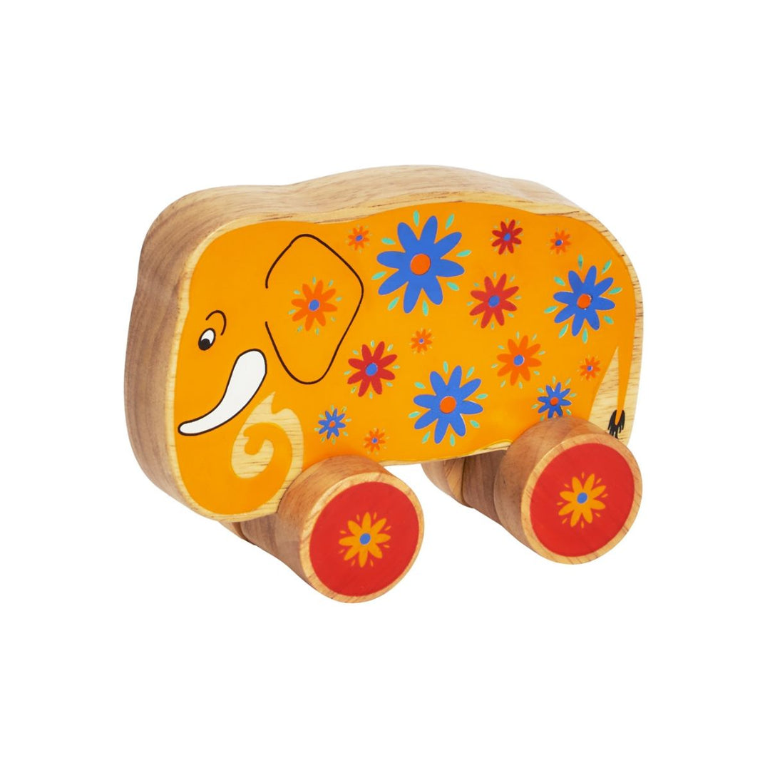 Lanka Kade wooden toy yellow elephant push along with floral patterns on a white background