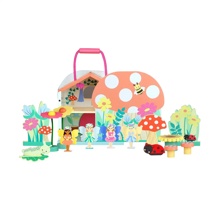 Orange Tree Toys colourful fairy house play set with mushroom house, fairies, and accessories on a white background