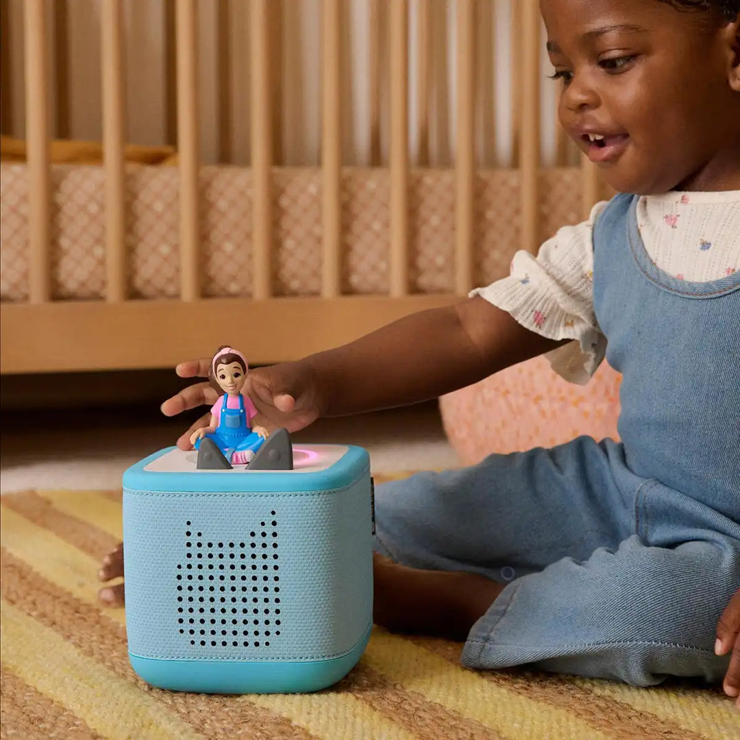 Ms. Rachel Tonies audio book figure outside