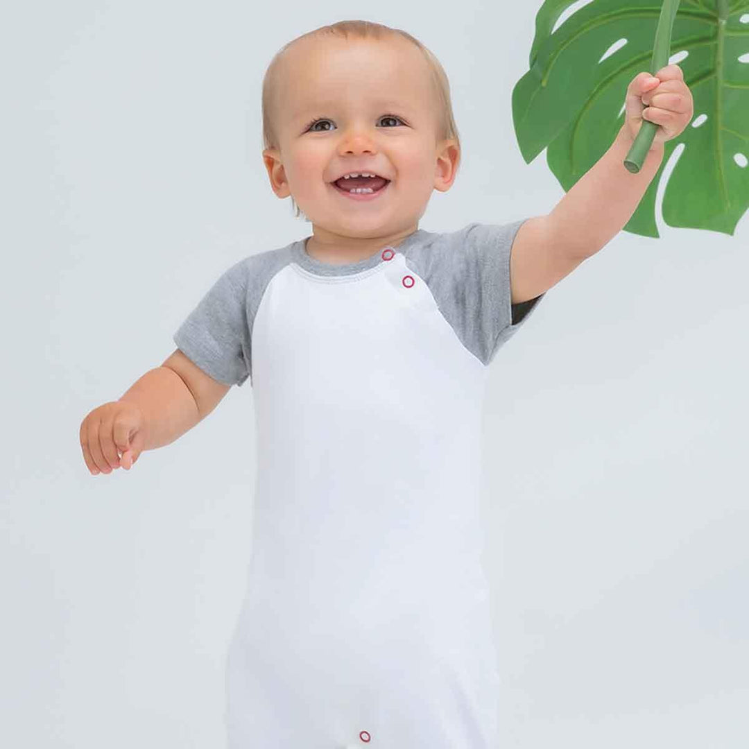 Little Tots Toys Organic Baby Baseball Playsuit in Heather being Worn Picture