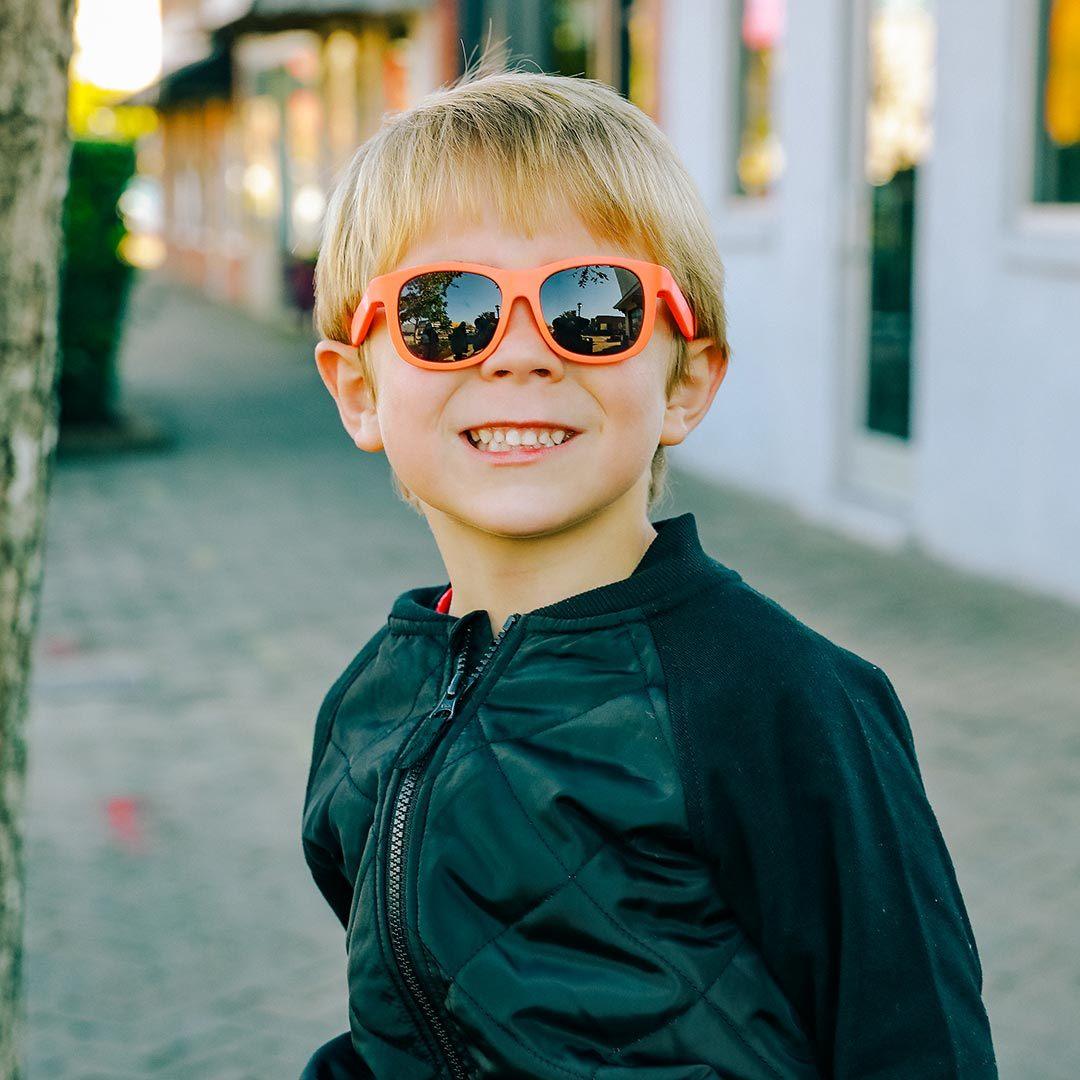 Babiators original navigator sunglasses in wacky watermelon being worn