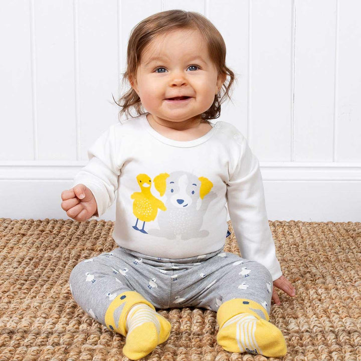 Kite eco-friendly GOTS certified organic cotton pup and duck bodysuit being worn