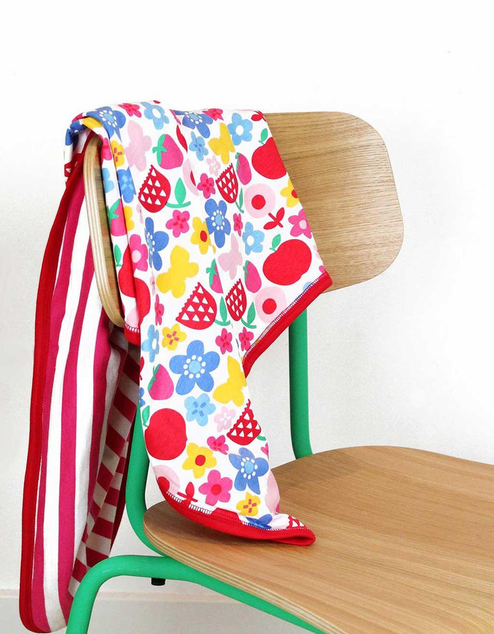 Toby Tiger GOTS Organic Cotton Butterfly Flower Blanket Hung Over Chair Picture